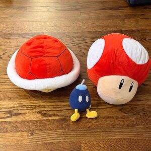 Nintendo Stuffed Toys- mushroom (13x12in), koopa shell (16x14in), bob-omb (8in)